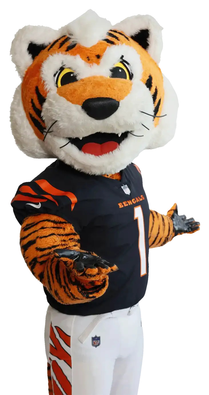 Bengals Mascot Who Dey gestures toward an image of a stunning new Fischer Home.